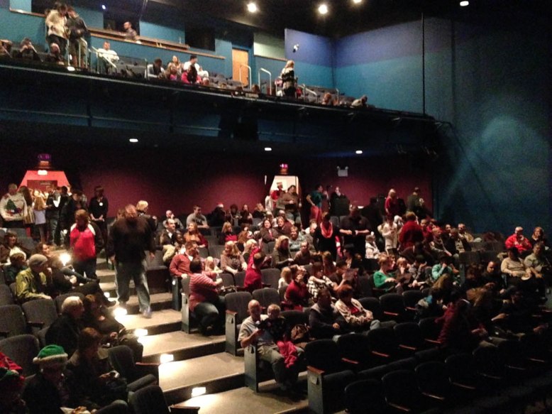 The sell-out crowd files in to see The Sandbox Rock and Roll Orchestra's annual Christmas concert.